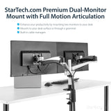 StarTech.com Desk Mount Dual Monitor Arm - Articulating - Supports VESA Monitors 12'' to 30'' - Adjustable - Grommet / Desk Mount - Premium - Silver (ARMDUAL30)